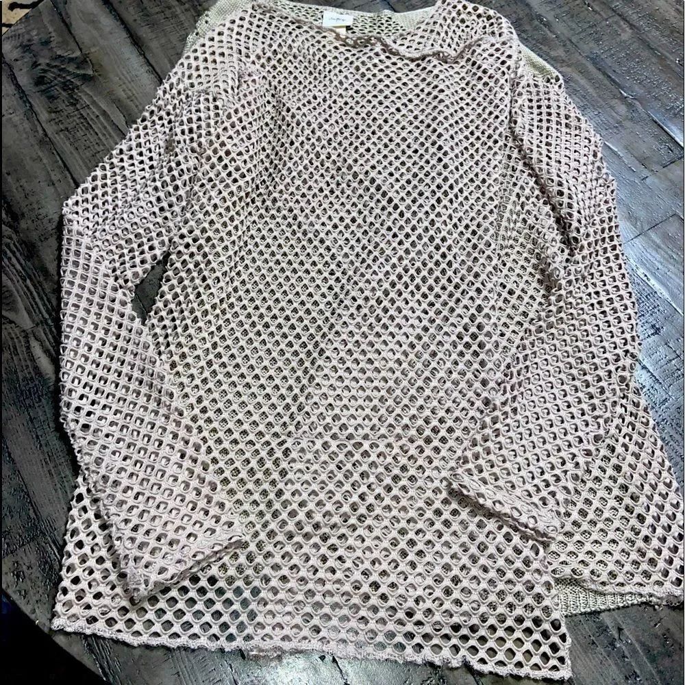 Daytrip long sleeve knit wrap around cardigan. Mid length tan color